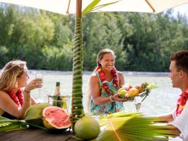 A couple having lunch on a private island in Bora Bora