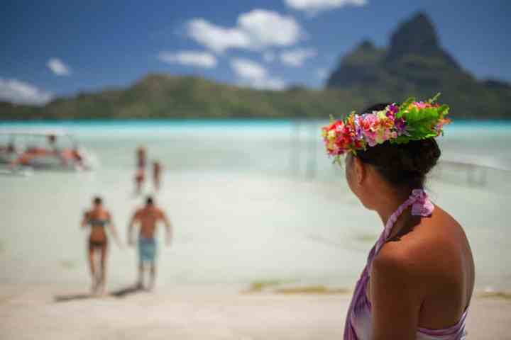 A woman waiting for her guests on Bora Bora private island