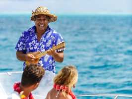 A couple onboard during a private boat tour in Bora Bora